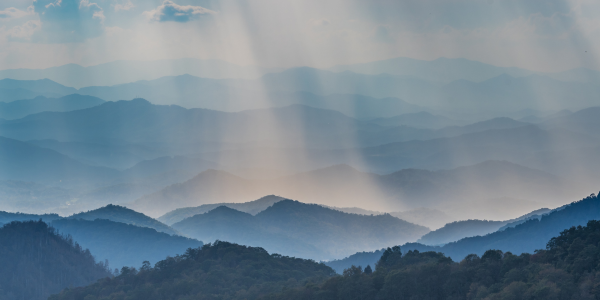 mountains, sky, light shining through clouds