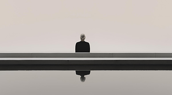 Person standing in silence